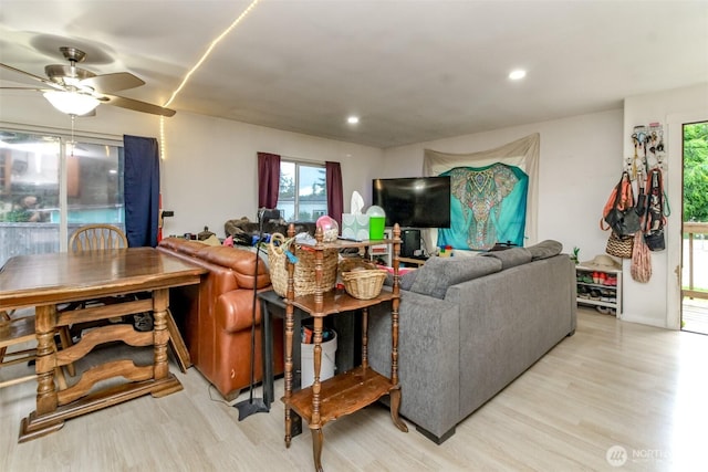 8715 Whitewood Loop SE, Yelm, WA 98597 - living room featuring light wood-style floors, ceiling fan, and recessed lighting