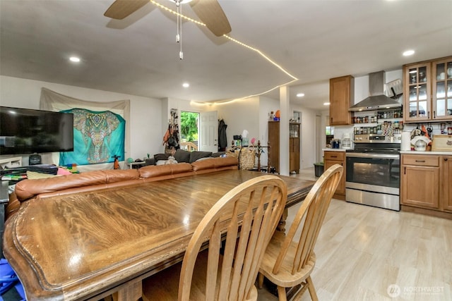 8715 Whitewood Loop SE, Yelm, WA 98597 - dining room with a ceiling fan, recessed lighting, and light wood-style floors