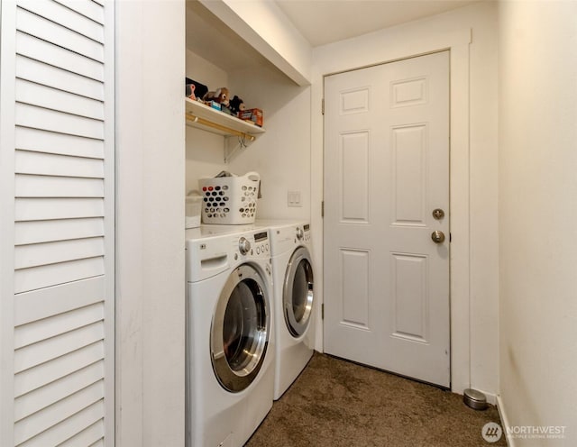 8715 Whitewood Loop SE, Yelm, WA 98597 - laundry room with washing machine and dryer and dark colored carpet