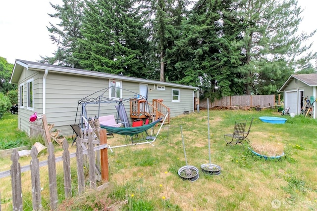 8715 Whitewood Loop SE, Yelm, WA 98597 - view of yard with an outdoor structure