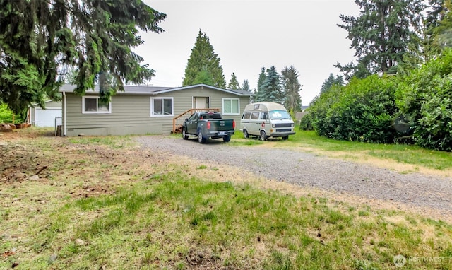 8715 Whitewood Loop SE, Yelm, WA 98597 - view of front of property with driveway