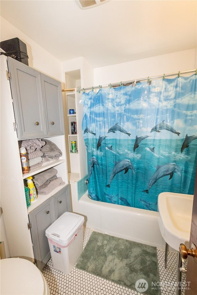 1107 S 4th St, Dayton, WA 99328 - bathroom featuring toilet and shower / bathtub combination with curtain