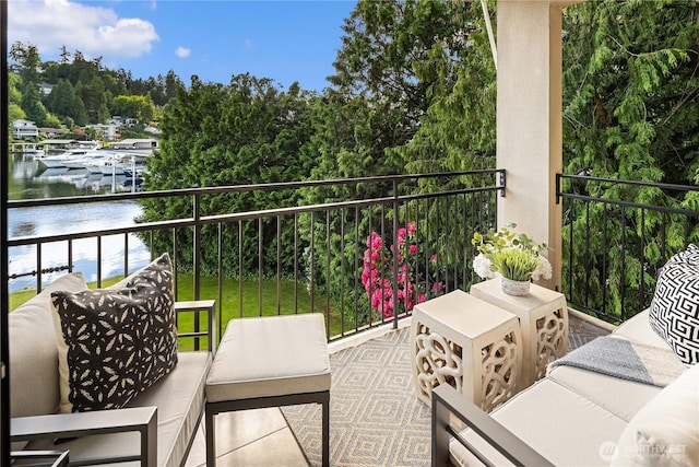 101 101st Ave SE Unit 201A, Bellevue, WA 98004 - balcony with a water view and an outdoor living space