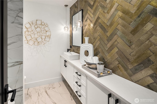 101 101st Ave SE Unit 201A, Bellevue, WA 98004 - full bathroom featuring double vanity and marble finish floors