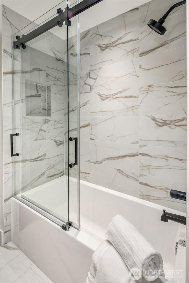 101 101st Ave SE Unit 201A, Bellevue, WA 98004 - full bathroom featuring shower / bath combination with glass door