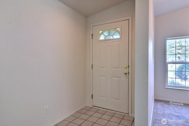4018 144th Street Ct NW Unit 59, Gig Harbor, WA 98332 - foyer with baseboards and light tile patterned floors