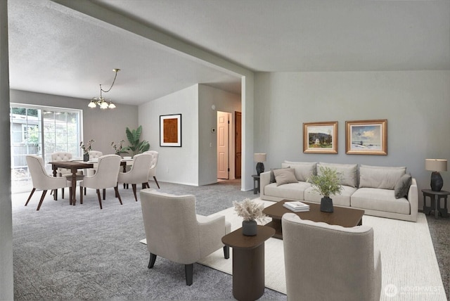 4018 144th Street Ct NW Unit 59, Gig Harbor, WA 98332 - living room featuring carpet, a chandelier, and lofted ceiling