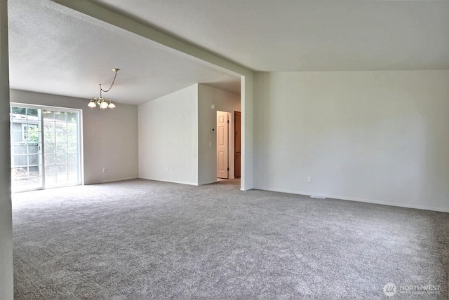 4018 144th Street Ct NW Unit 59, Gig Harbor, WA 98332 - spare room with carpet floors and a chandelier