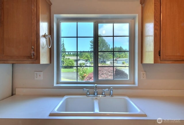 4018 144th Street Ct NW Unit 59, Gig Harbor, WA 98332 - kitchen featuring light countertops and brown cabinetry