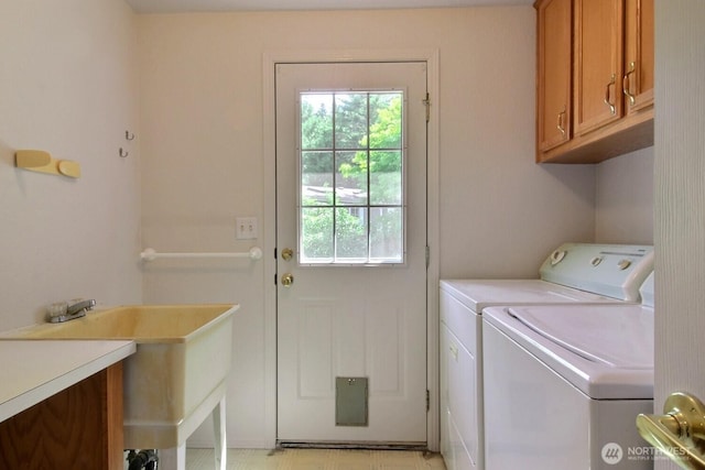 4018 144th Street Ct NW Unit 59, Gig Harbor, WA 98332 - laundry area with cabinet space and washing machine and dryer