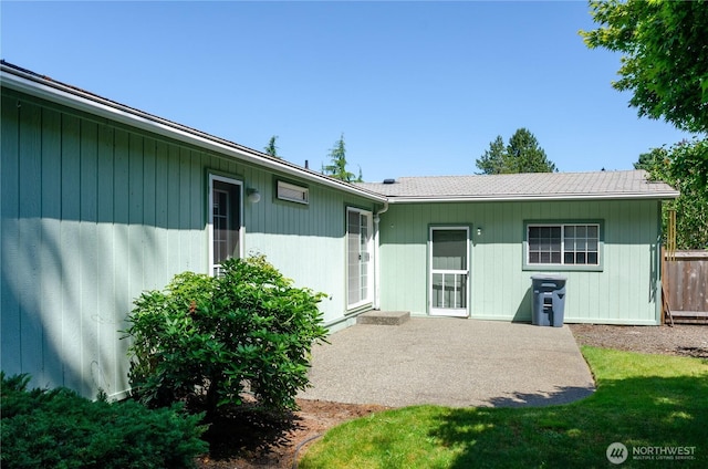 4018 144th Street Ct NW Unit 59, Gig Harbor, WA 98332 - rear view of property with a patio area