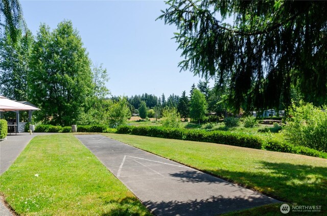 4018 144th Street Ct NW Unit 59, Gig Harbor, WA 98332 - view of home's community with shuffleboard, a yard, and a gazebo