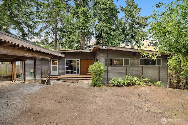 1711 E Lake Sammamish Pl SE, Sammamish, WA 98075 - rear view of property with a deck