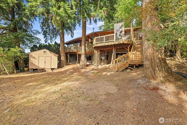 1711 E Lake Sammamish Pl SE, Sammamish, WA 98075 - rear view of house featuring a storage unit, a wooden deck, and stairway