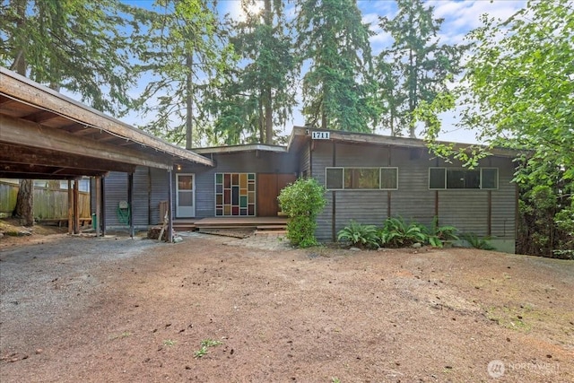 1711 E Lake Sammamish Pl SE, Sammamish, WA 98075 - back of property featuring a deck and a carport