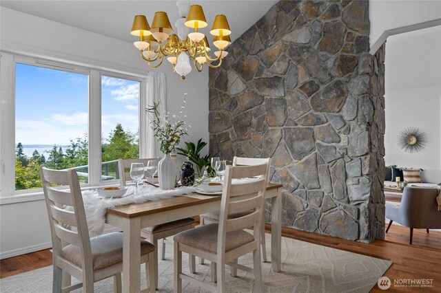3995 Bay Ln, Anacortes, WA 98221 - dining area with a chandelier and wood finished floors