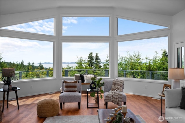 3995 Bay Ln, Anacortes, WA 98221 - sunroom featuring lofted ceiling and wood finished floors