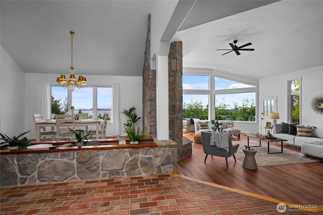 3995 Bay Ln, Anacortes, WA 98221 - dining space featuring lofted ceiling, a chandelier, and a ceiling fan