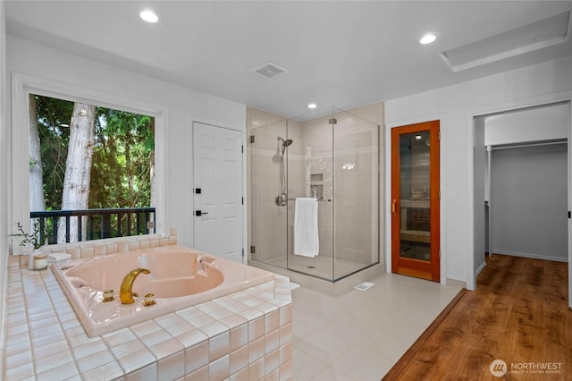 3995 Bay Ln, Anacortes, WA 98221 - bathroom with a stall shower, a bath, and recessed lighting