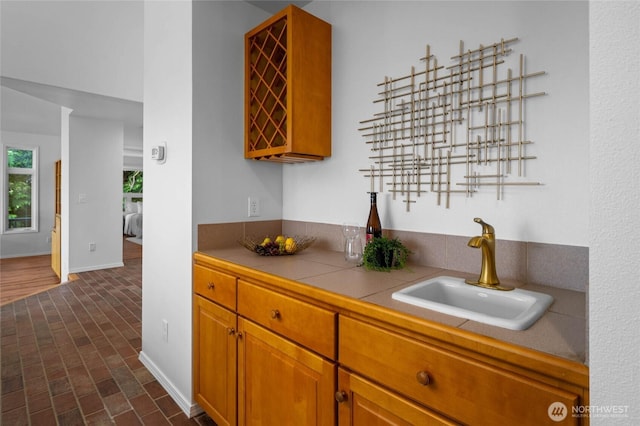 3995 Bay Ln, Anacortes, WA 98221 - indoor bar with brick patterned flooring and baseboards