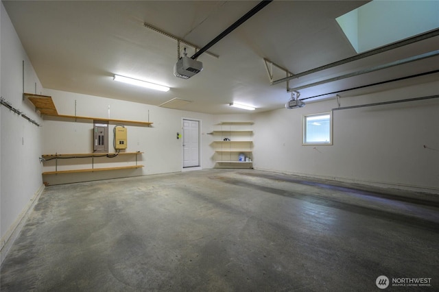 3995 Bay Ln, Anacortes, WA 98221 - garage featuring a garage door opener and electric panel
