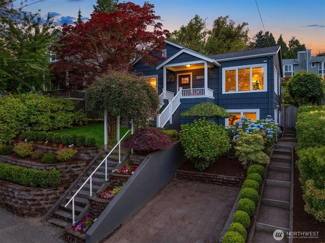 3833 24th Ave W, Seattle, WA 98199 - view of front of property featuring stairway and covered porch