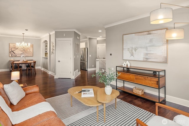 3833 24th Ave W, Seattle, WA 98199 - living room with a chandelier, wood finished floors, recessed lighting, and ornamental molding