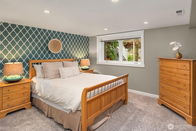 3833 24th Ave W, Seattle, WA 98199 - bedroom with an accent wall, light colored carpet, recessed lighting, and wallpapered walls