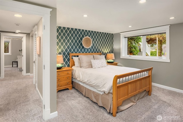 3833 24th Ave W, Seattle, WA 98199 - bedroom with an accent wall, light colored carpet, and recessed lighting