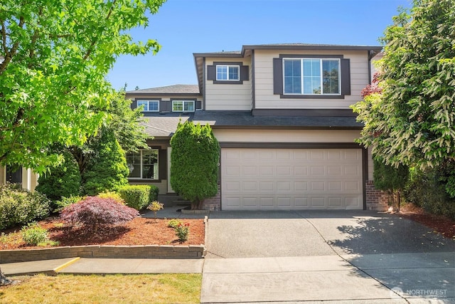 3610 147th Pl SE, Mill Creek, WA 98012 - view of front of house featuring driveway, a garage, and brick siding