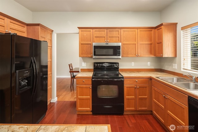 3610 147th Pl SE, Mill Creek, WA 98012 - kitchen featuring black appliances, tile countertops, dark wood finished floors, and brown cabinetry