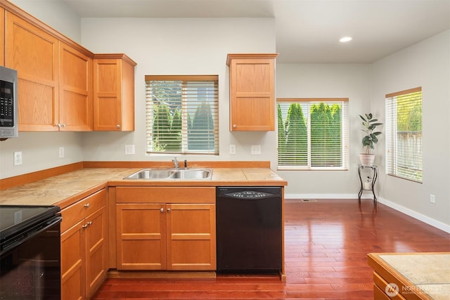 3610 147th Pl SE, Mill Creek, WA 98012 - kitchen featuring black appliances, dark wood-style flooring, tile counters, and recessed lighting