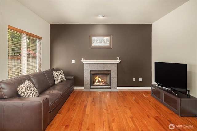 3610 147th Pl SE, Mill Creek, WA 98012 - living room featuring wood finished floors and a fireplace