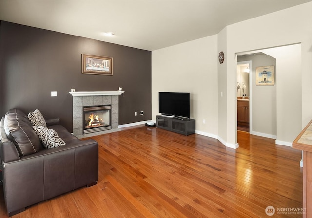 3610 147th Pl SE, Mill Creek, WA 98012 - living room featuring wood finished floors and a tile fireplace