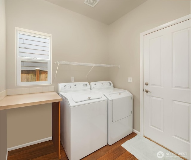 3610 147th Pl SE, Mill Creek, WA 98012 - laundry area featuring washing machine and clothes dryer and wood finished floors