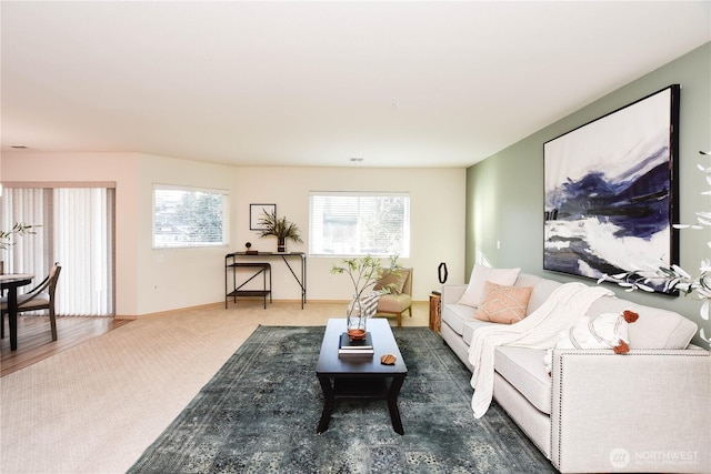 1318 37th St Unit 2-428, Everett, WA 98201 - carpeted living room featuring baseboards
