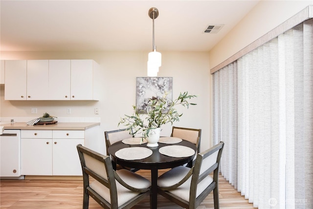 1318 37th St Unit 2-428, Everett, WA 98201 - dining area with light wood finished floors