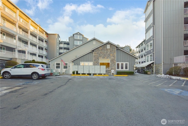 1318 37th St Unit 2-428, Everett, WA 98201 - view of building exterior featuring uncovered parking
