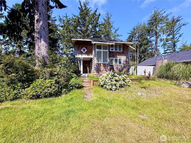 877 Mount Olympus Ave SE, Ocean Shores, WA 98569 - view of front facade featuring a front yard