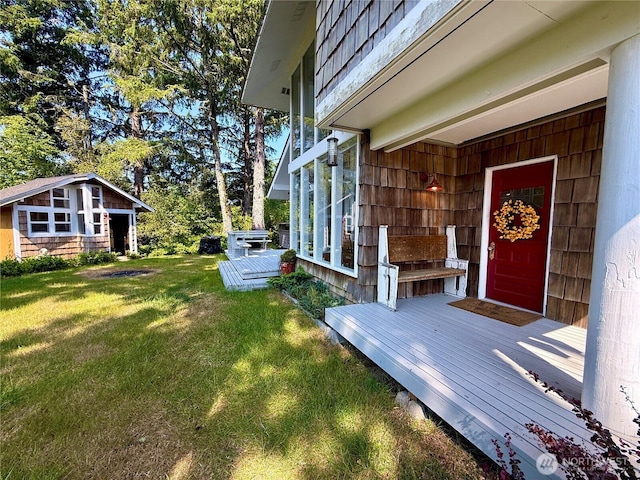 877 Mount Olympus Ave SE, Ocean Shores, WA 98569 - view of green lawn with a wooden deck