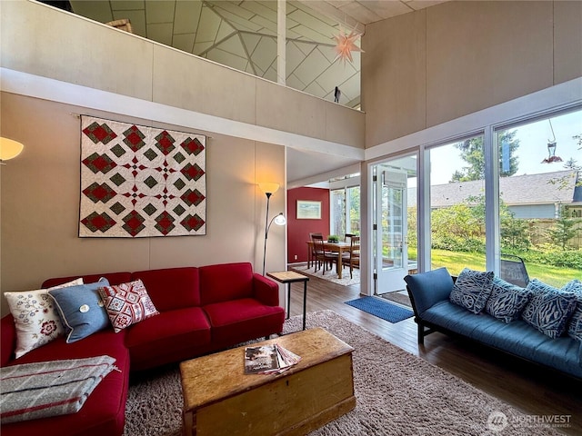 877 Mount Olympus Ave SE, Ocean Shores, WA 98569 - living area with a high ceiling and wood finished floors