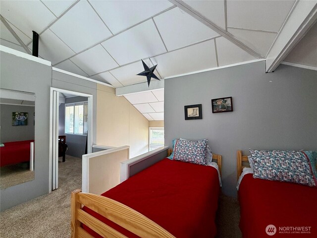 877 Mount Olympus Ave SE, Ocean Shores, WA 98569 - carpeted bedroom featuring multiple windows and vaulted ceiling
