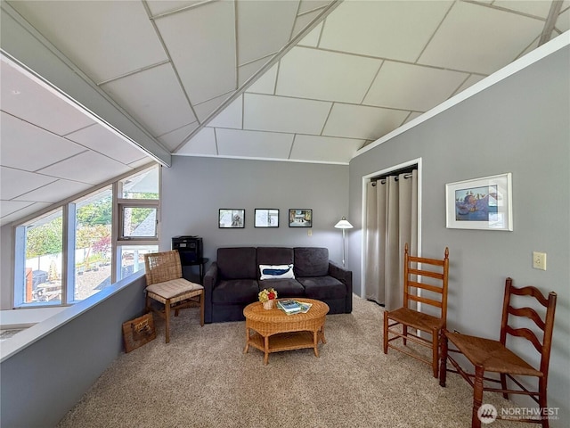 877 Mount Olympus Ave SE, Ocean Shores, WA 98569 - carpeted living area featuring vaulted ceiling