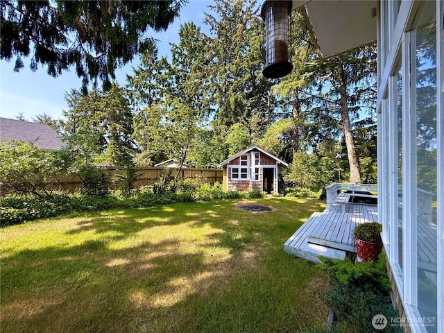 877 Mount Olympus Ave SE, Ocean Shores, WA 98569 - view of yard featuring an outbuilding and a wooden deck