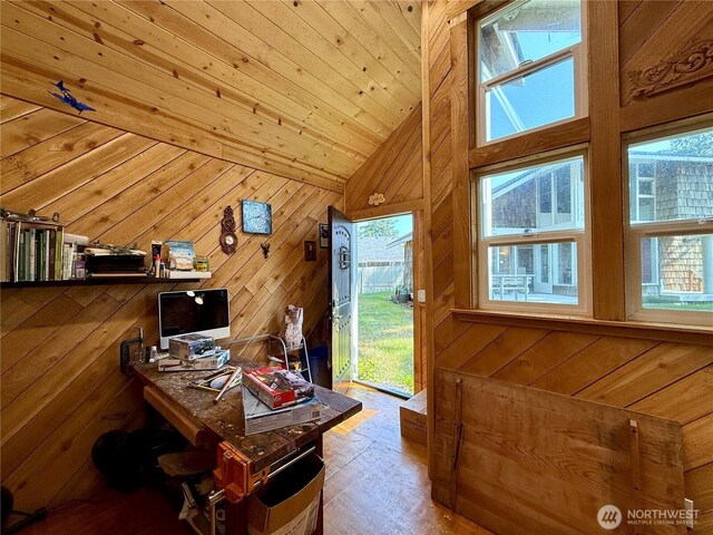 877 Mount Olympus Ave SE, Ocean Shores, WA 98569 - office area featuring healthy amount of natural light, wood walls, lofted ceiling, wood finished floors, and wood ceiling
