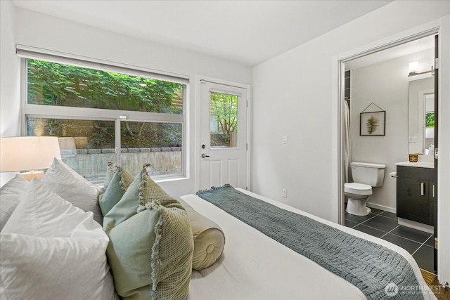1110 Martin Luther King Jr Way S Unit A, Seattle, WA 98144 - bedroom featuring multiple windows, tile patterned floors, and ensuite bath