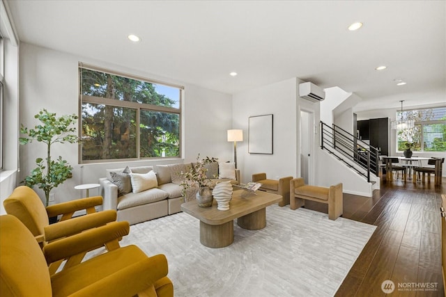 1110 Martin Luther King Jr Way S Unit A, Seattle, WA 98144 - living room featuring a wall unit AC, recessed lighting, hardwood / wood-style flooring, stairs, and a chandelier