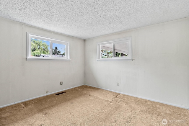 29432 59th Ave S, Auburn, WA 98001 - carpeted spare room with a textured ceiling and baseboards