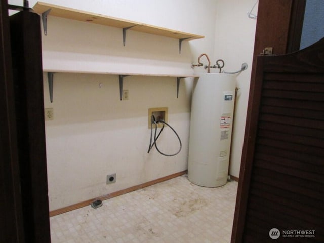 725 W Main, Morton, WA 98356 - laundry room featuring washer hookup, electric water heater, light flooring, and electric dryer hookup