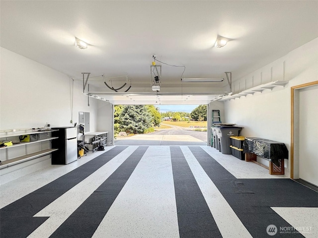 206 Buckhorn, Sequim, WA 98382 - garage featuring freestanding refrigerator